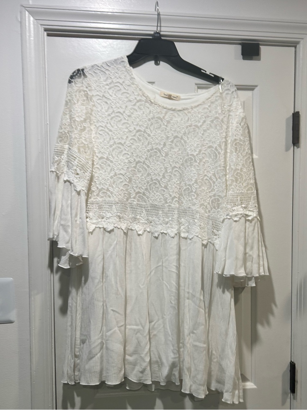 Super cute white dress. Great with cowboy boots